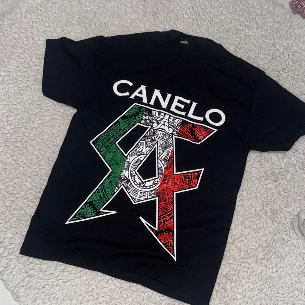 Canelo T shirt 
Unisex regular shirt Size S